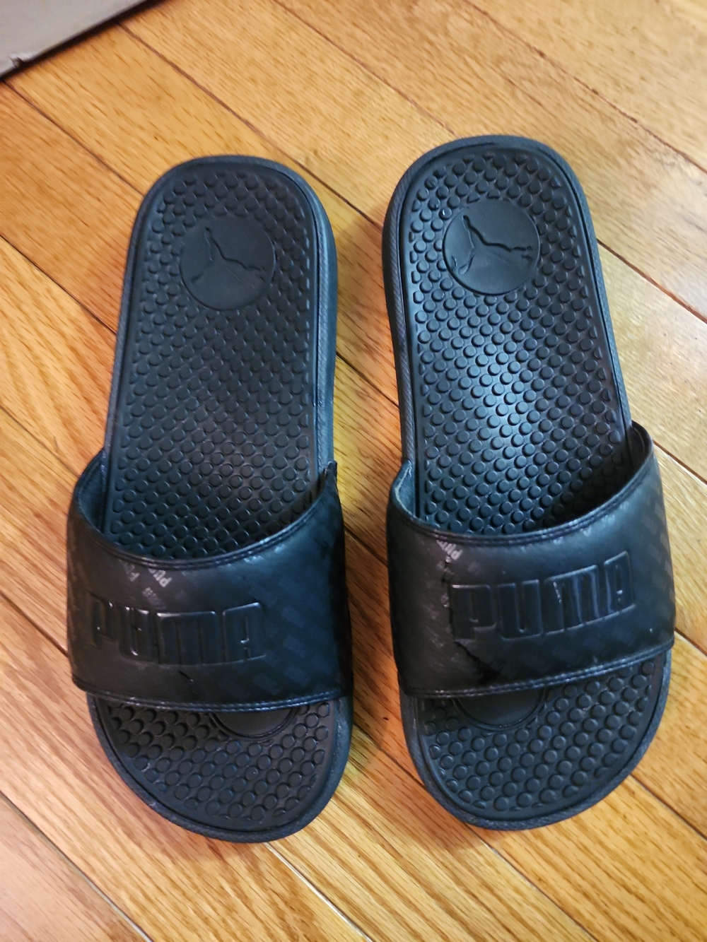 Puma Cool Cat Women’s Black On Black Repeat Slide Sandals with Textured Footbed
